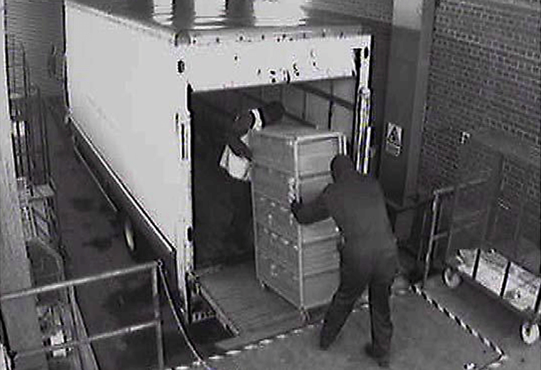 CCTV camera still on thieves loading a van
