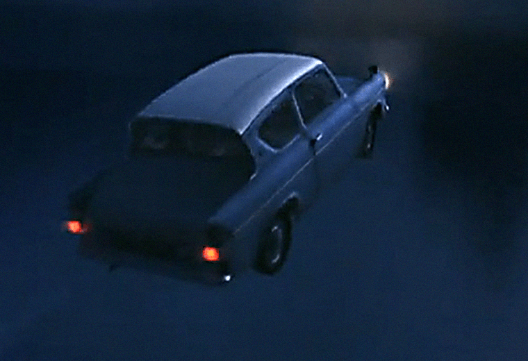 Harry Potter: Harry and Ron chase the Hogwarts Express in a flying Ford Anglia.