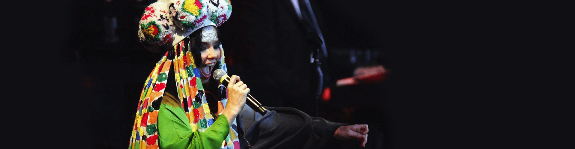 Bjork wearing one of her vibrant stage outfits