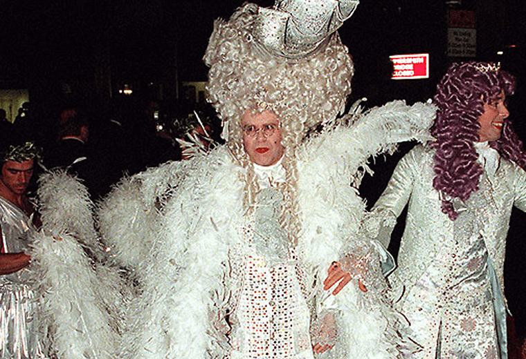 Elton John in his famous Louis XV style fancy dress wig and custome