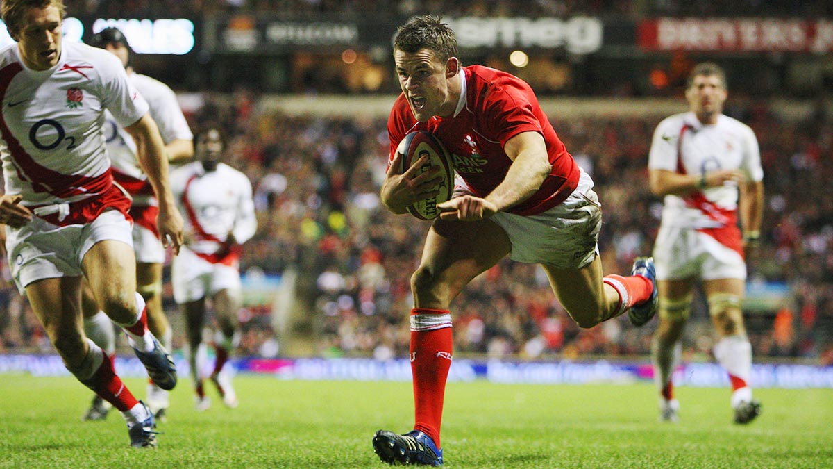 Wales’ Mike Phillips scoring a try against England