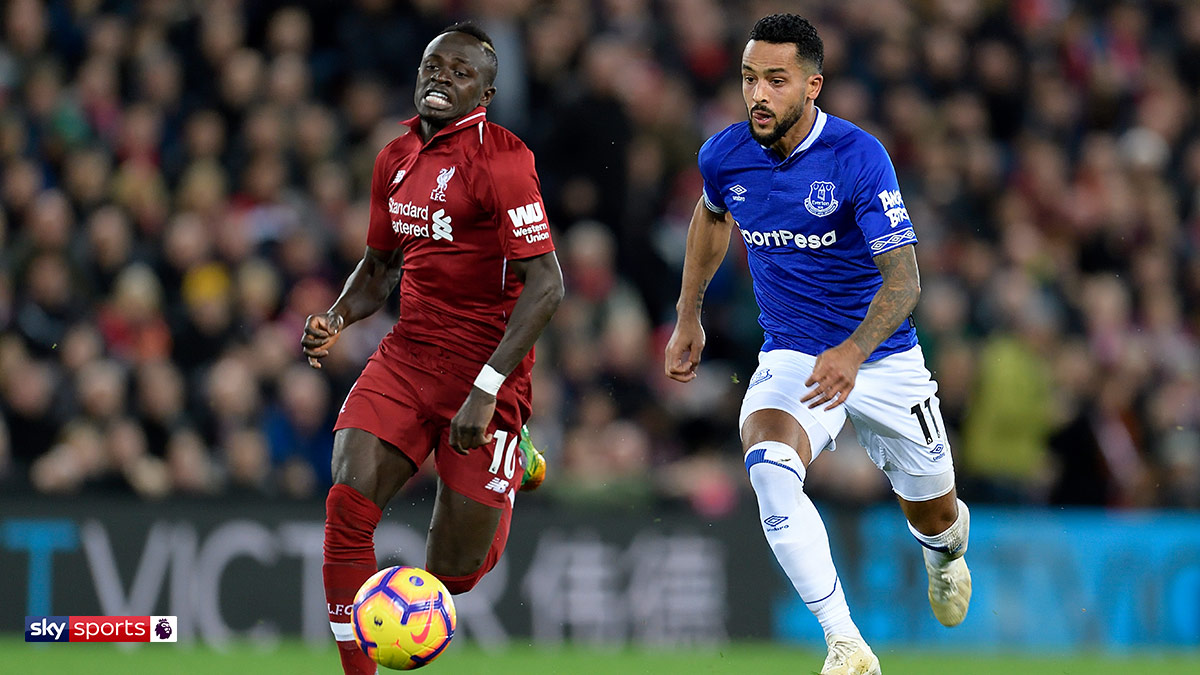 Liverpool’s Sadio Mané and Everton’s Theo Walcott