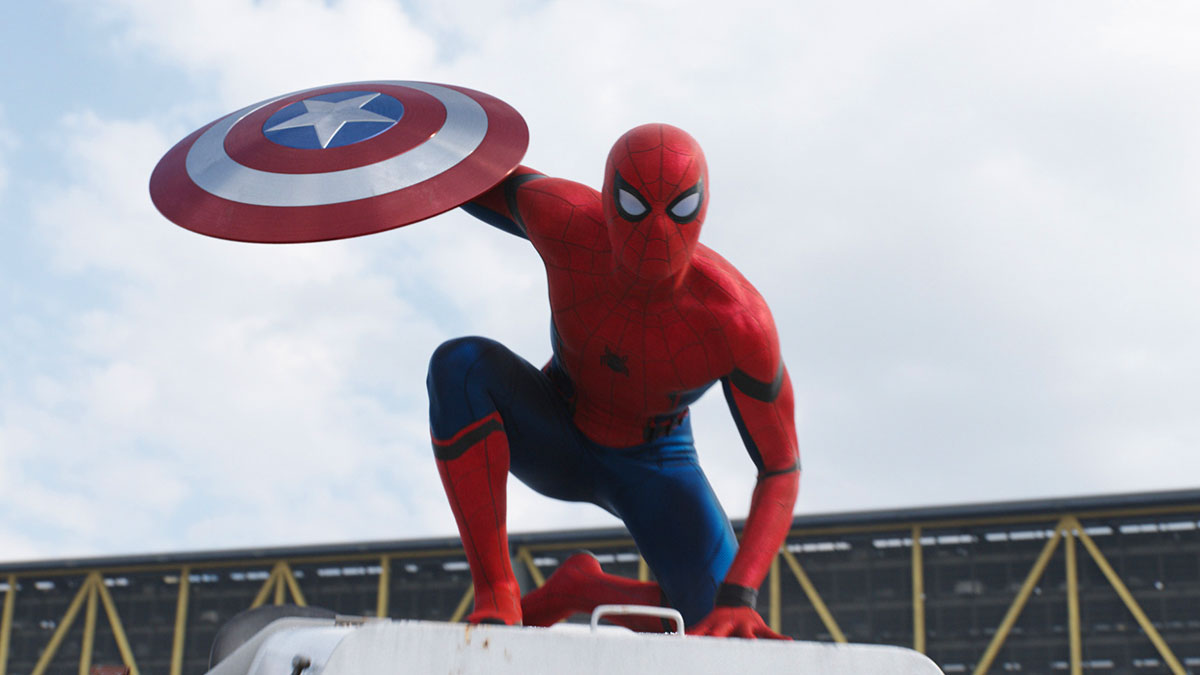 Spider-Man (Tom Holland) holding Captain America’s shield in Captain America: Civil War
