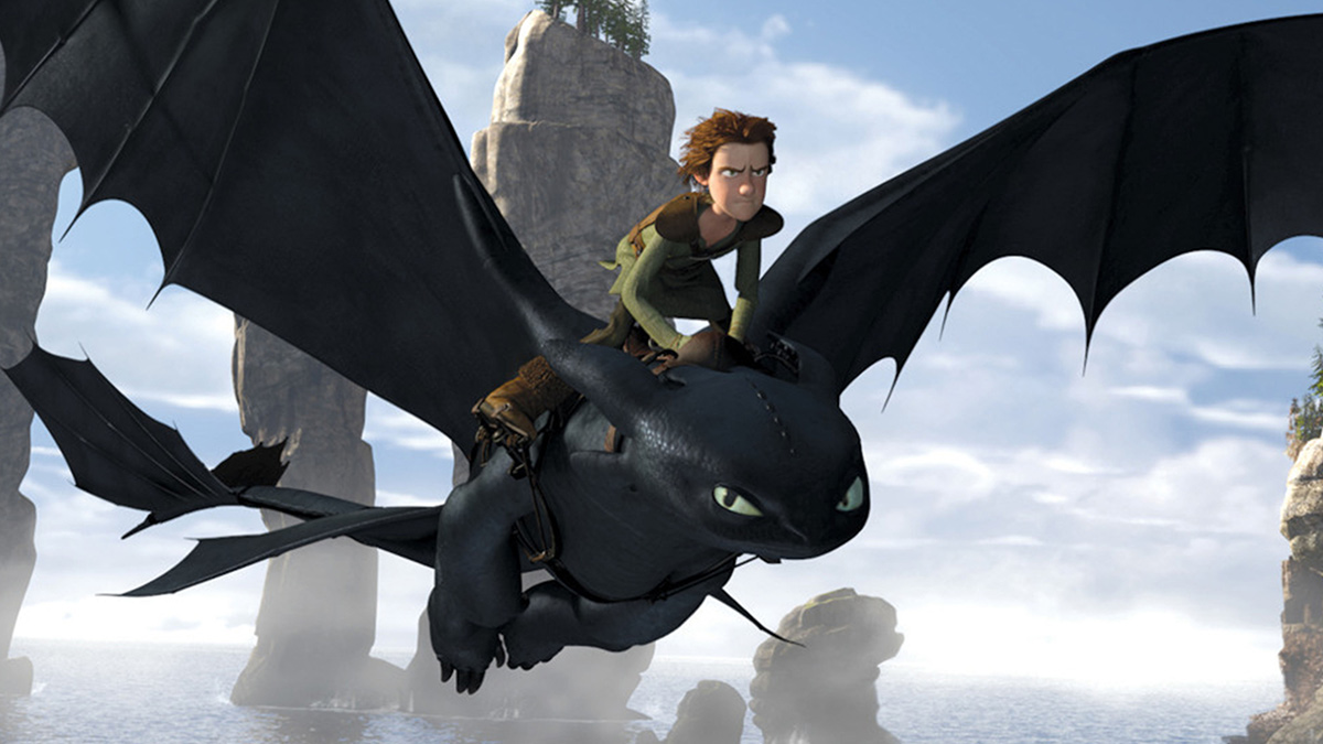Hiccup riding Toothless in How To Train Your Dragon: The Hidden World
