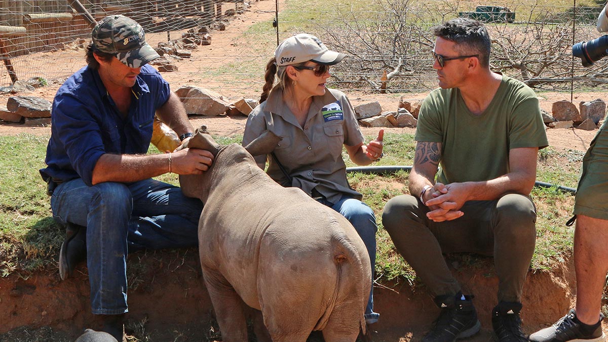 Ex-England cricketerKevin Pietersen chats with conservationists in Save This Rhino on National Geographic