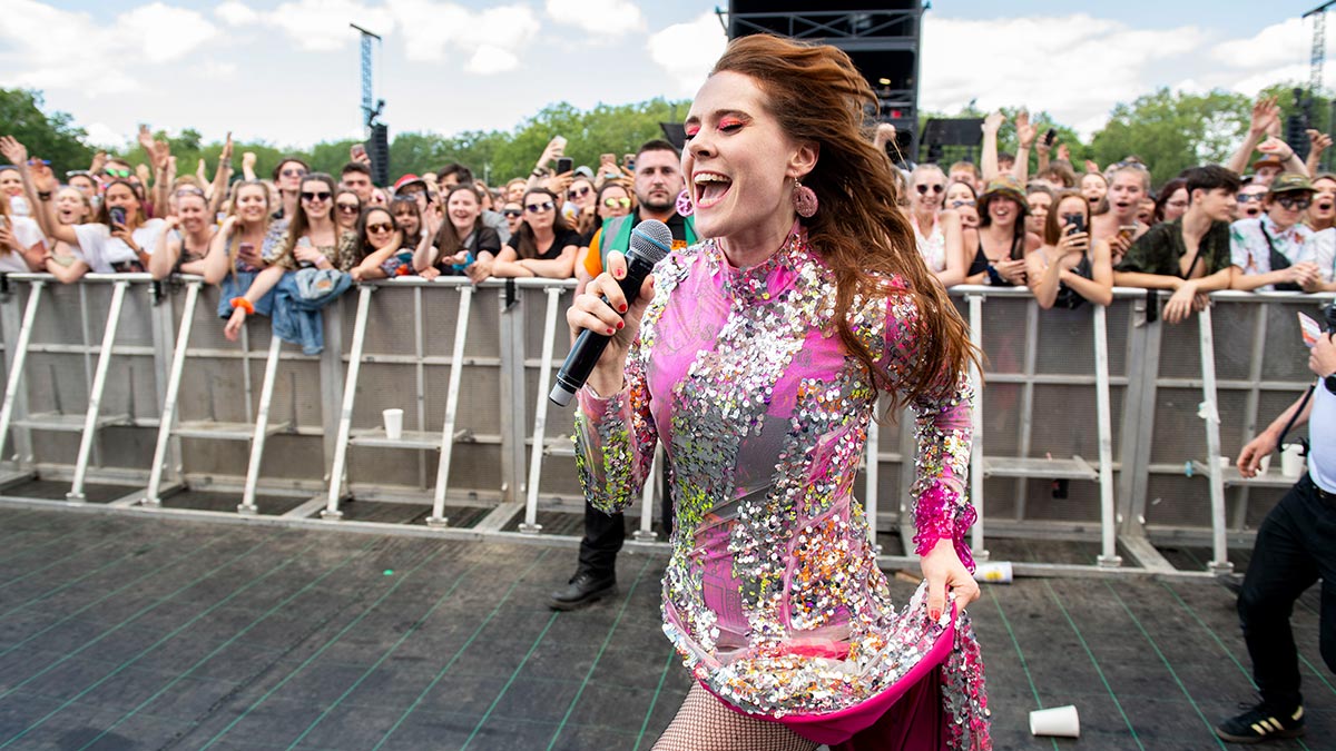 Singer Kate Nash entertains a crowd at a festival