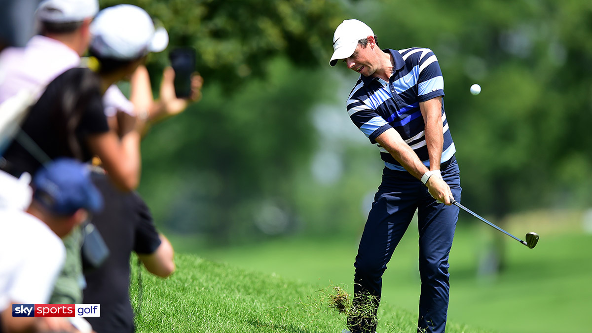 Golfer Rory McIlroy takes a swing