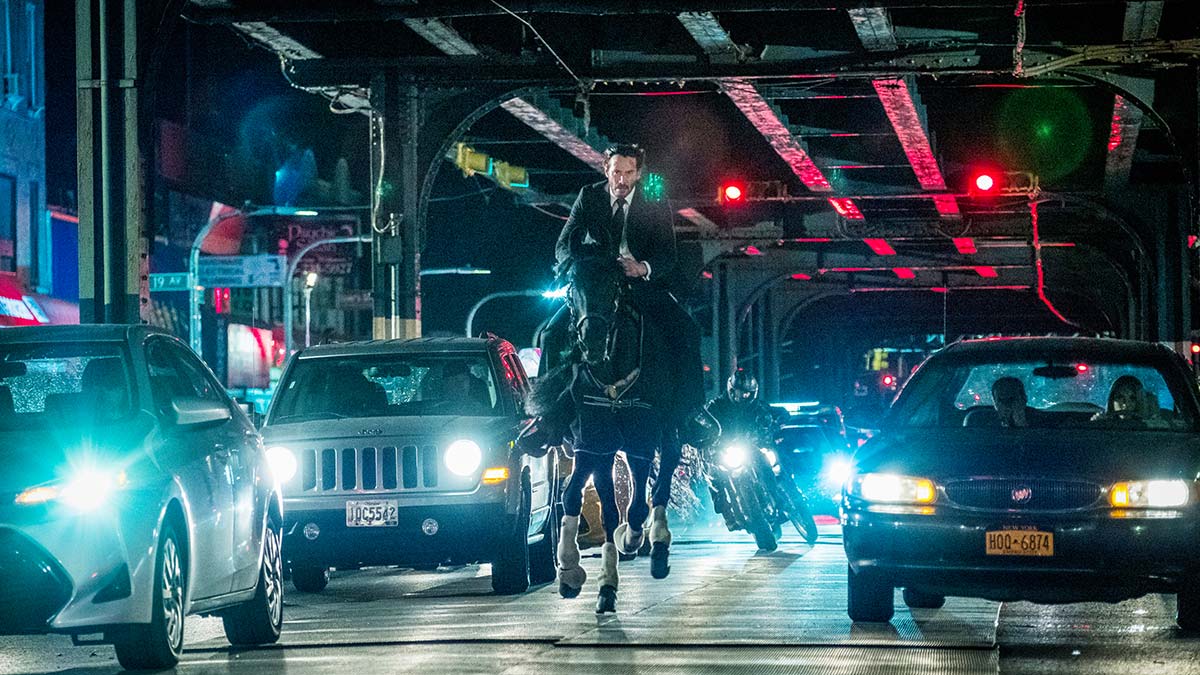 Keanu Reeves riding a horse in John Wick: Chapter 3 – Parabellum