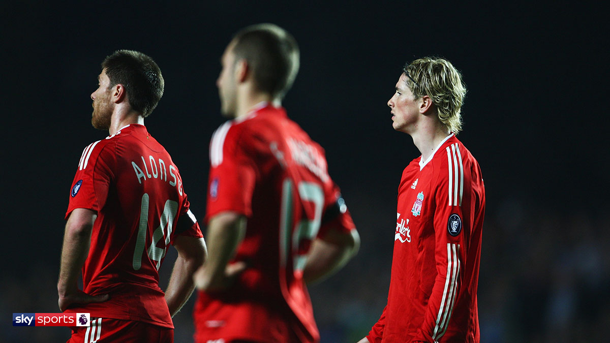 Liverpool players look on following a defeat to Chelsea in 2009