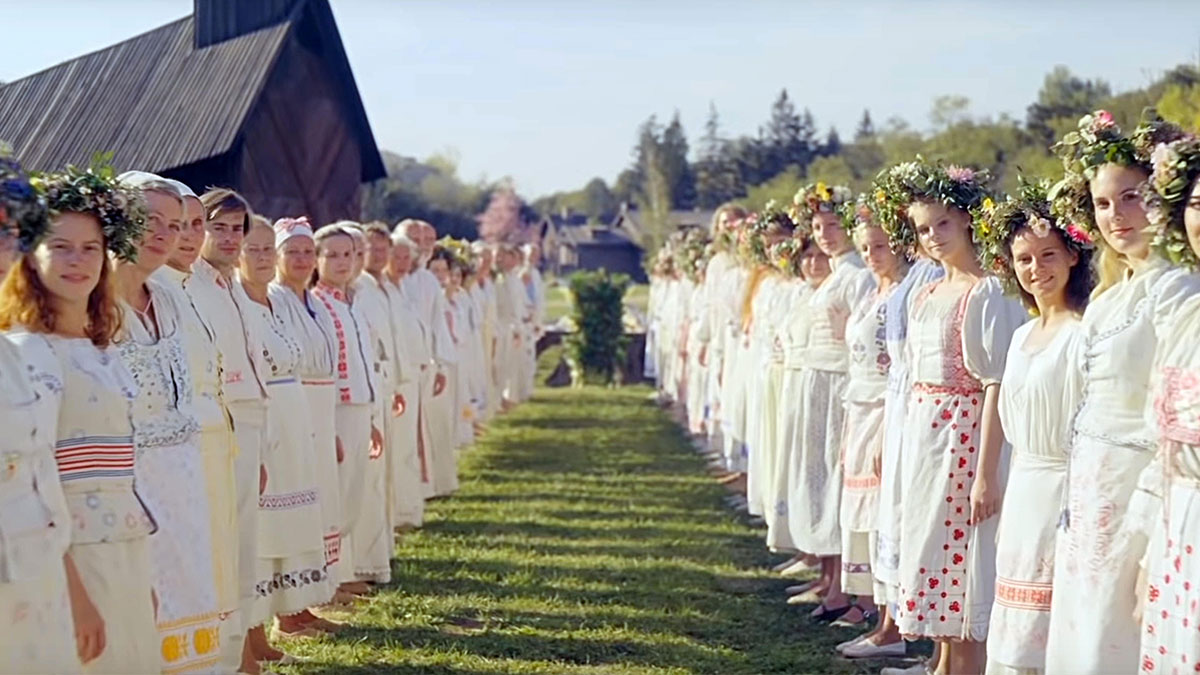 Cult members form a walkway in Midsommar