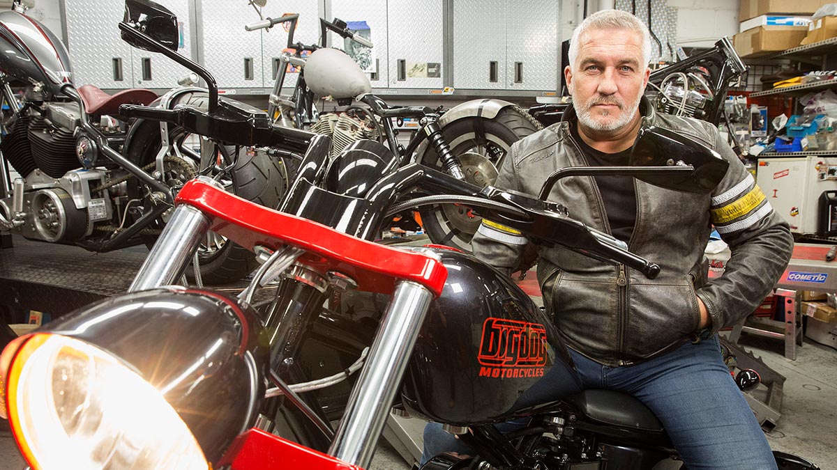 Paul Hollywood sat atop a motorcycle