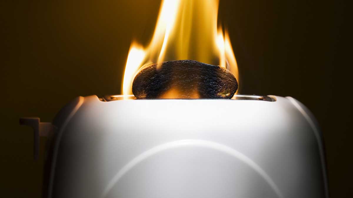 Image of burnt toast in a toaster