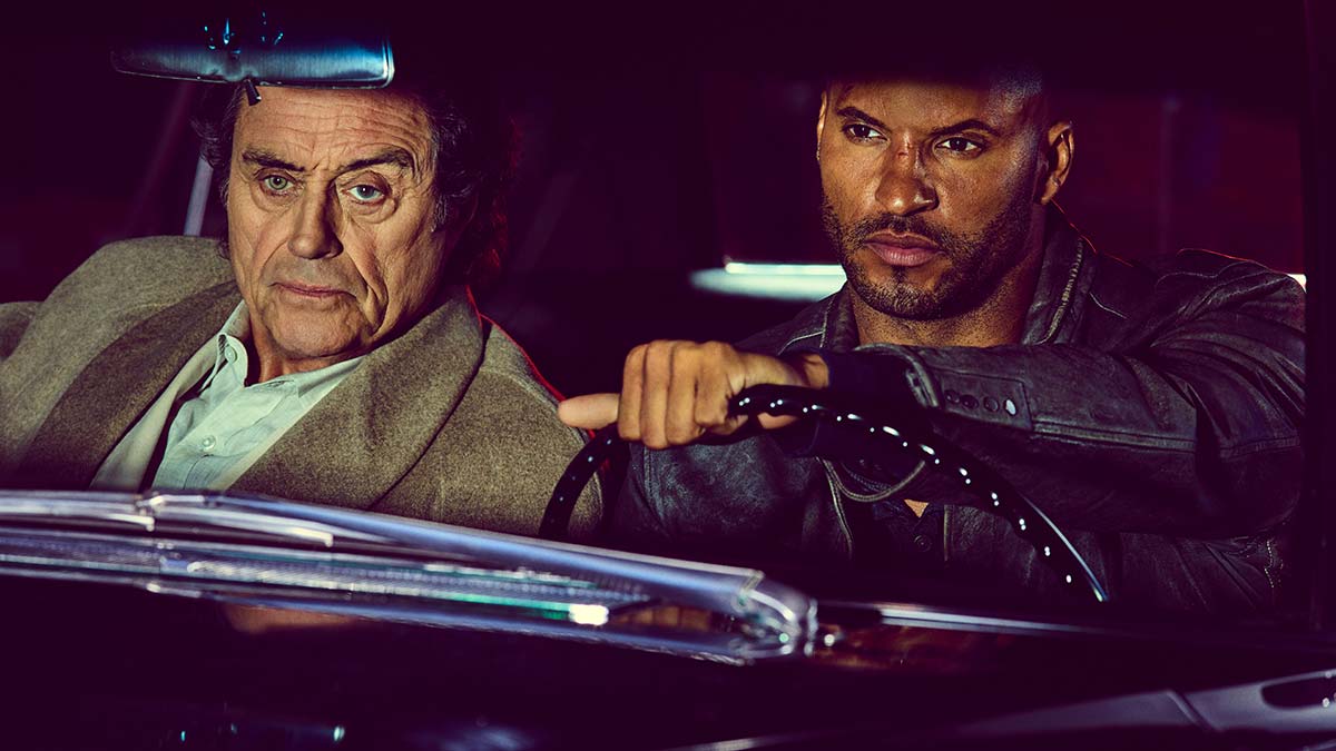 Ian McShane and Ricky Whittle in American Gods