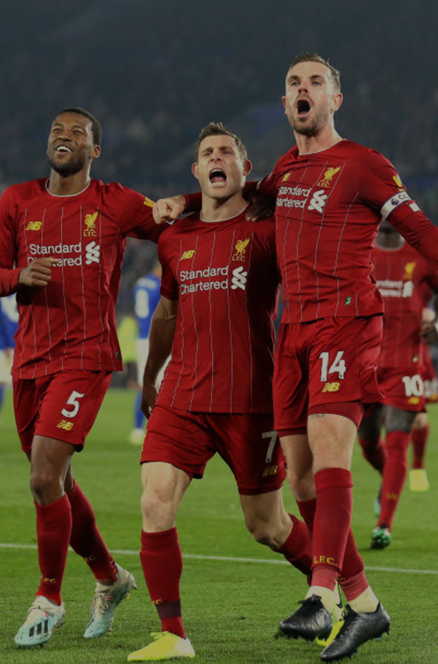 Jordan Henderson, James Milner, Gini Wijnaldum and Roberto Firmino celebrating for Liverpool