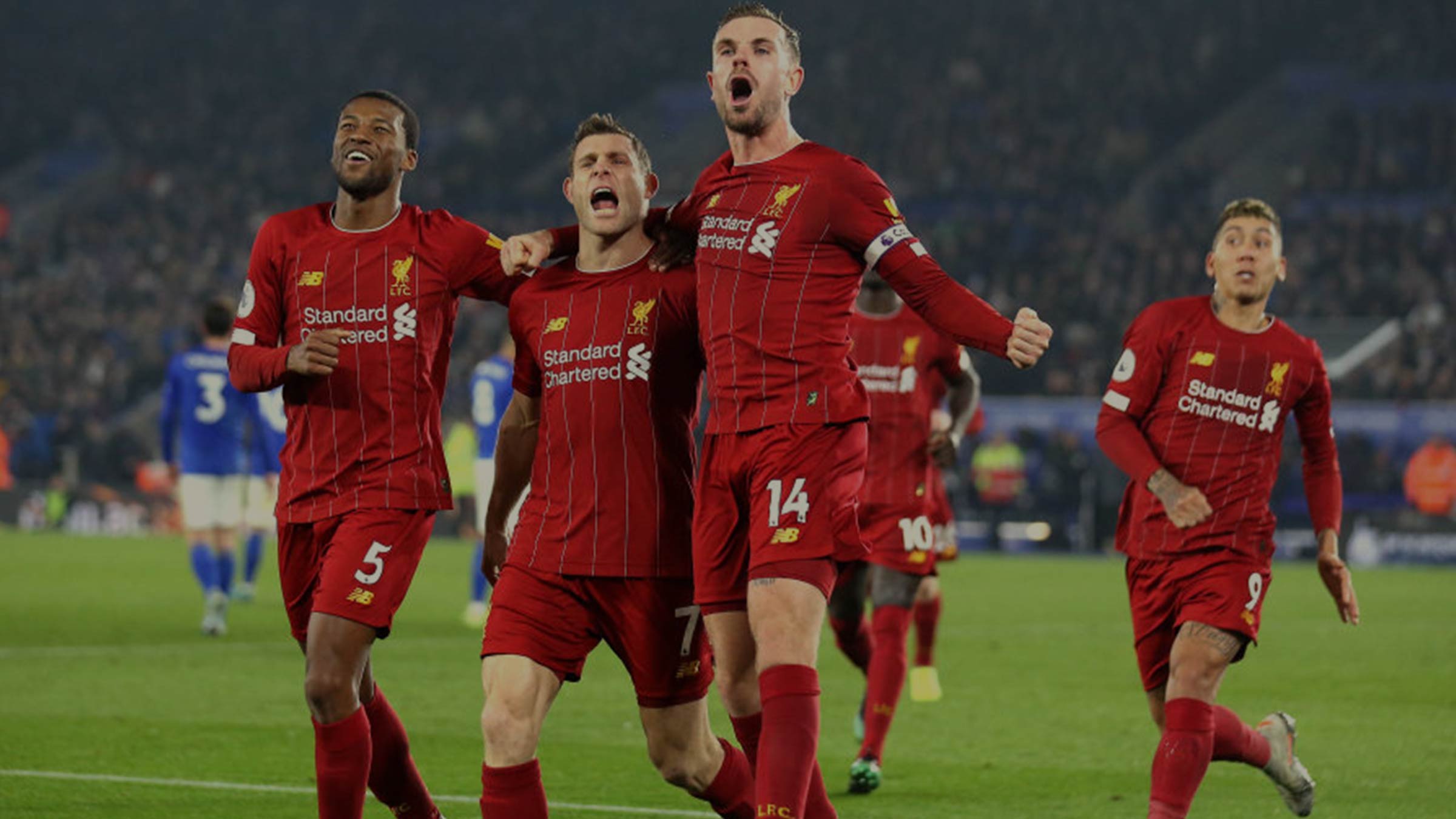 Jordan Henderson, James Milner, Gini Wijnaldum and Roberto Firmino celebrating for Liverpool