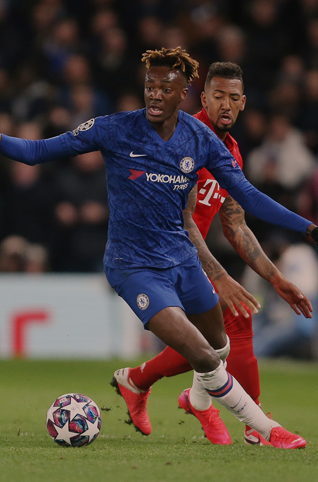 Chelsea’s Tammy Abraham takes on Bayern Munich’s Jerome Boateng in the UEFA Champions League