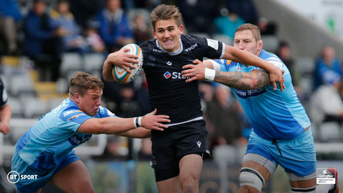 Newcastle Falcons’ Toby Flood evading two opponents
