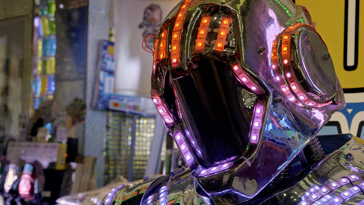 LED lights attached to a metal helmet in The Great Guide To The Future
