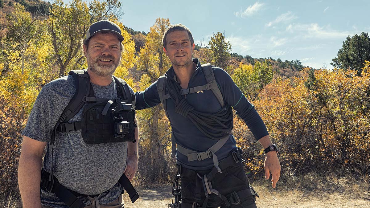 Bear Grylls and actor Rainn Wilson in Running Wild