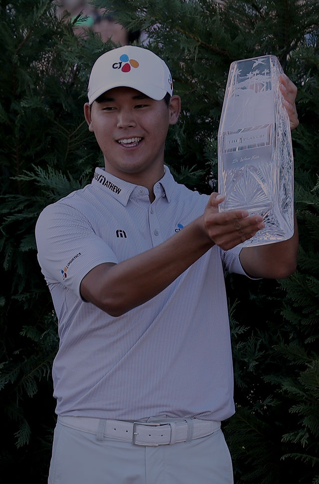 Kim Si-woo with Players Championship Trophy